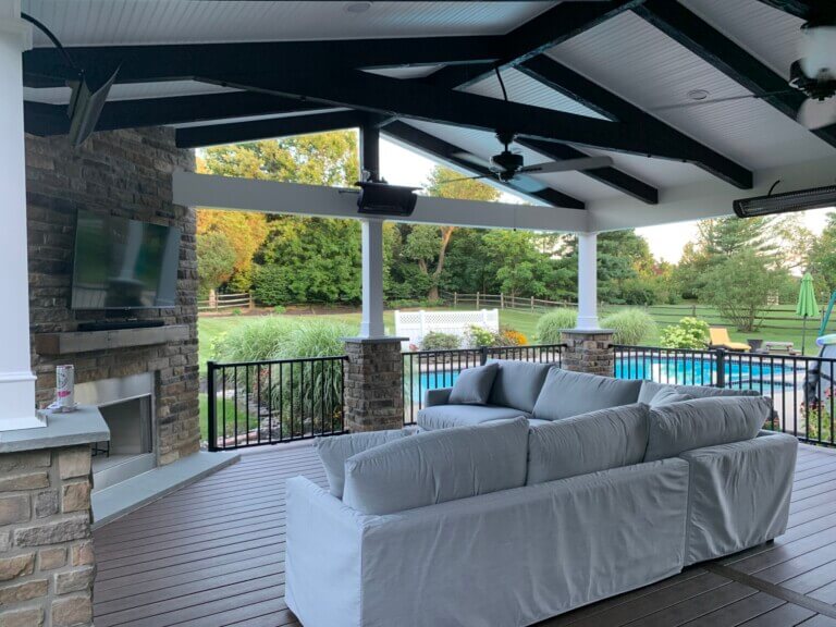 Outdoor fireplace and covered porch
