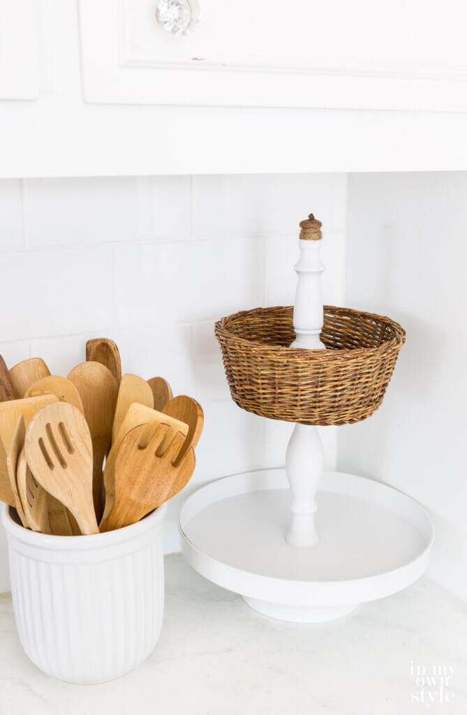 Tiered kitchen basket to make to store fruit and produce on a counter.