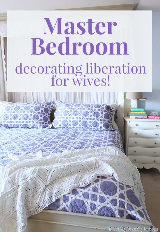 Purple quilt on master bedroom bed. Text overlay says Master Bedroom decorating liberation for wives!