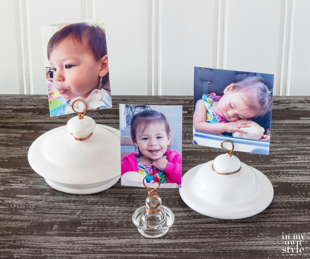 3 Finished Ceramic or Glass Jar lids made into a way to display photos.