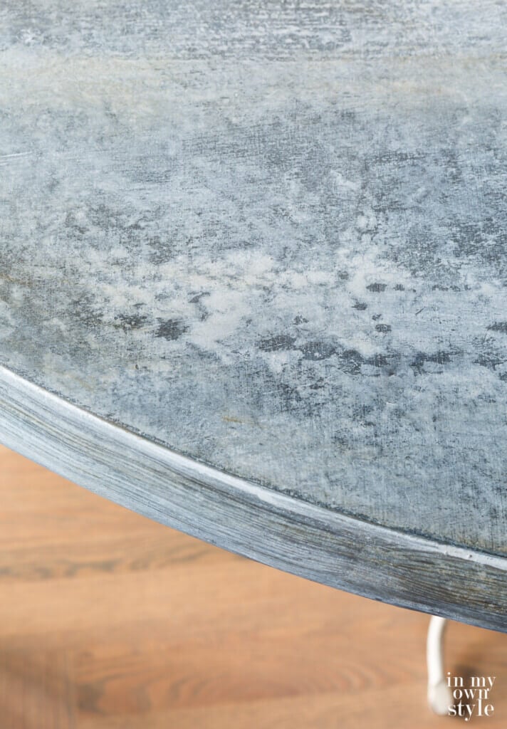 Finished painted faux zinc finish.
