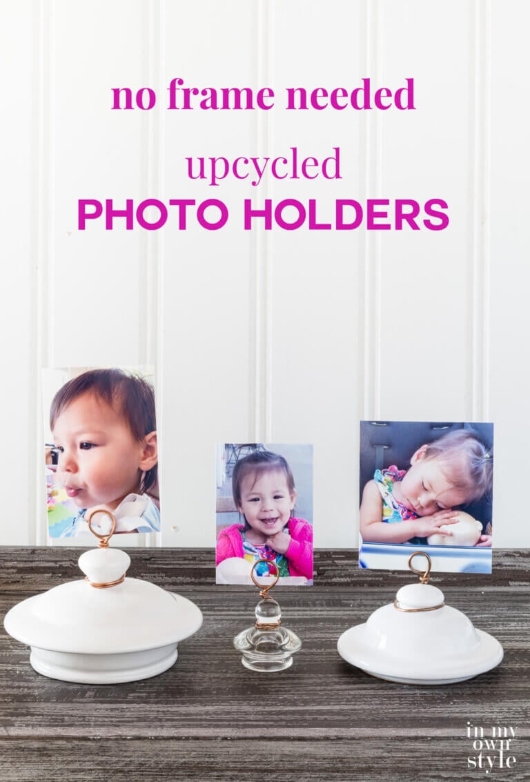 3 teapot lid and jar lid photo holders lined up on a table. Text overlay says no frame needed upcycled photo holders.