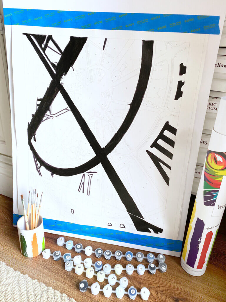 Paint by numbers mounted on foam core to make painting it easier.
