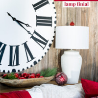 Rustic red and white corner of room decorated for Christmas. Text overlay says DIY Christmas ornament lamp finial