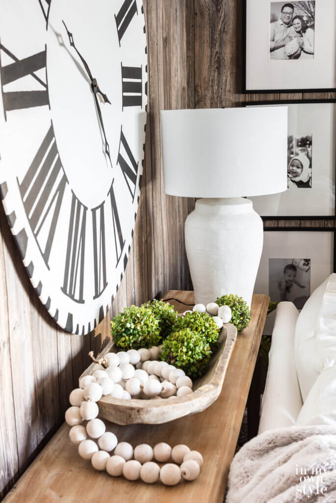 DIY makeover of an ugly table lamp. After image of the newly transformed lamp on a sofa table.
