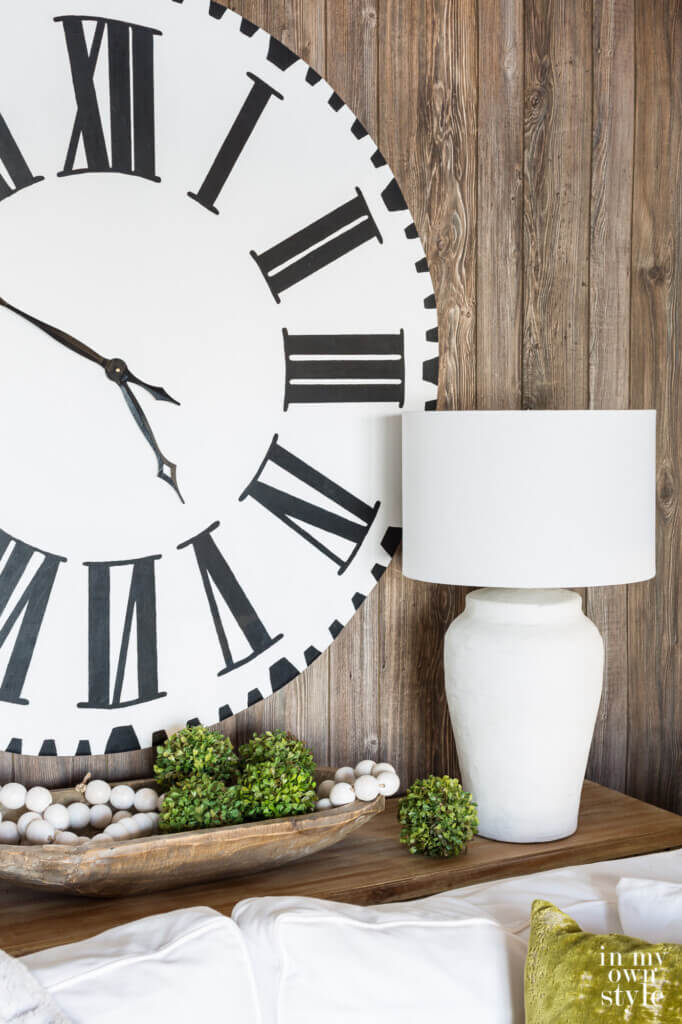 DIY makeover of an ugly table lamp. After image of the newly transformed lamp on a sofa table.