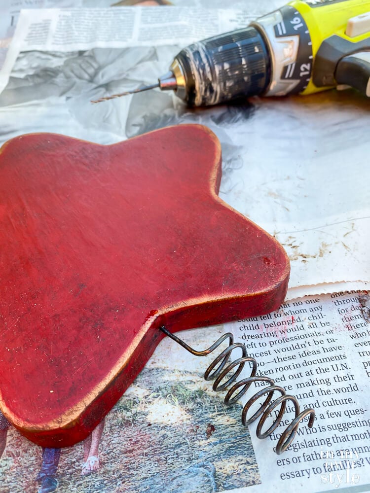 Completed DIy wood star topper ready to place on tree.