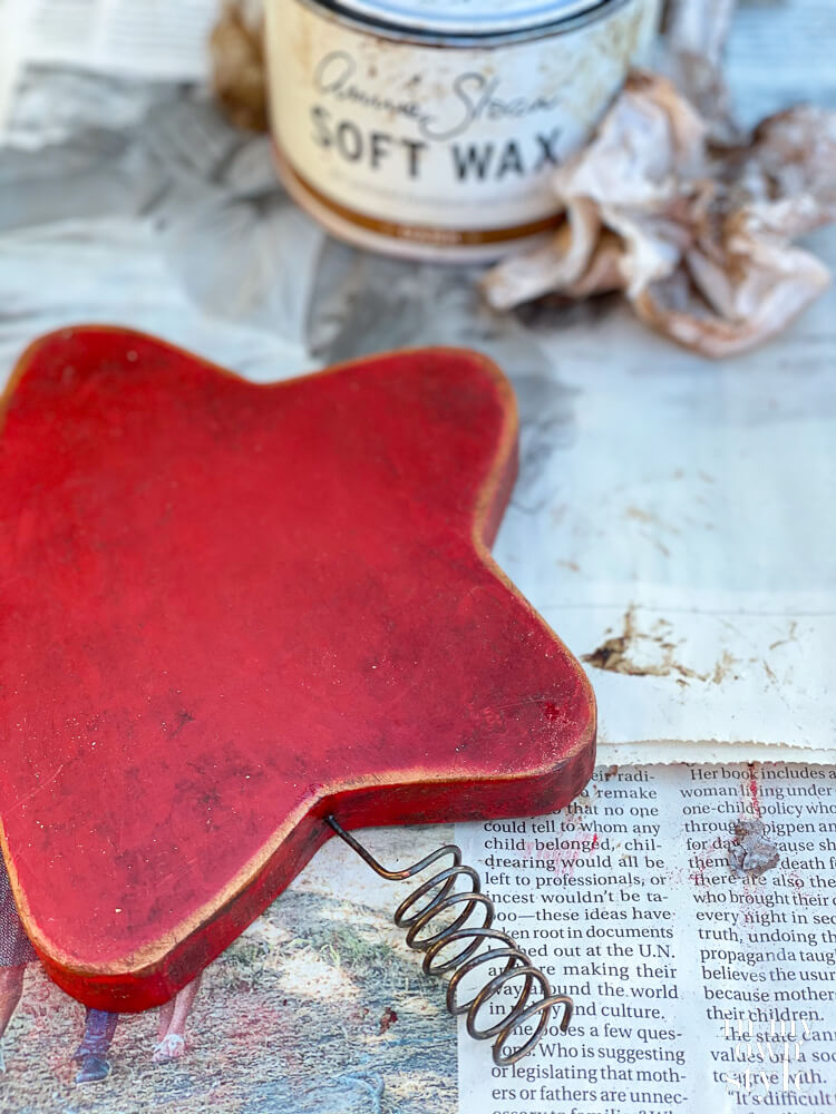 DIY Wood star tree topper painted red with soft wax