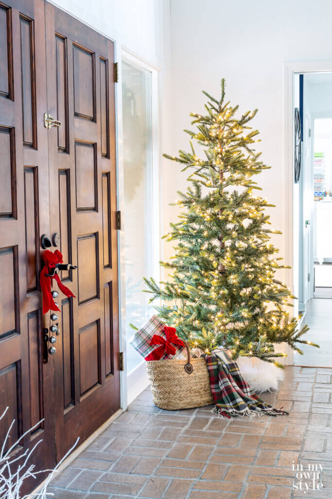 Christmas tree in foyer with white lights