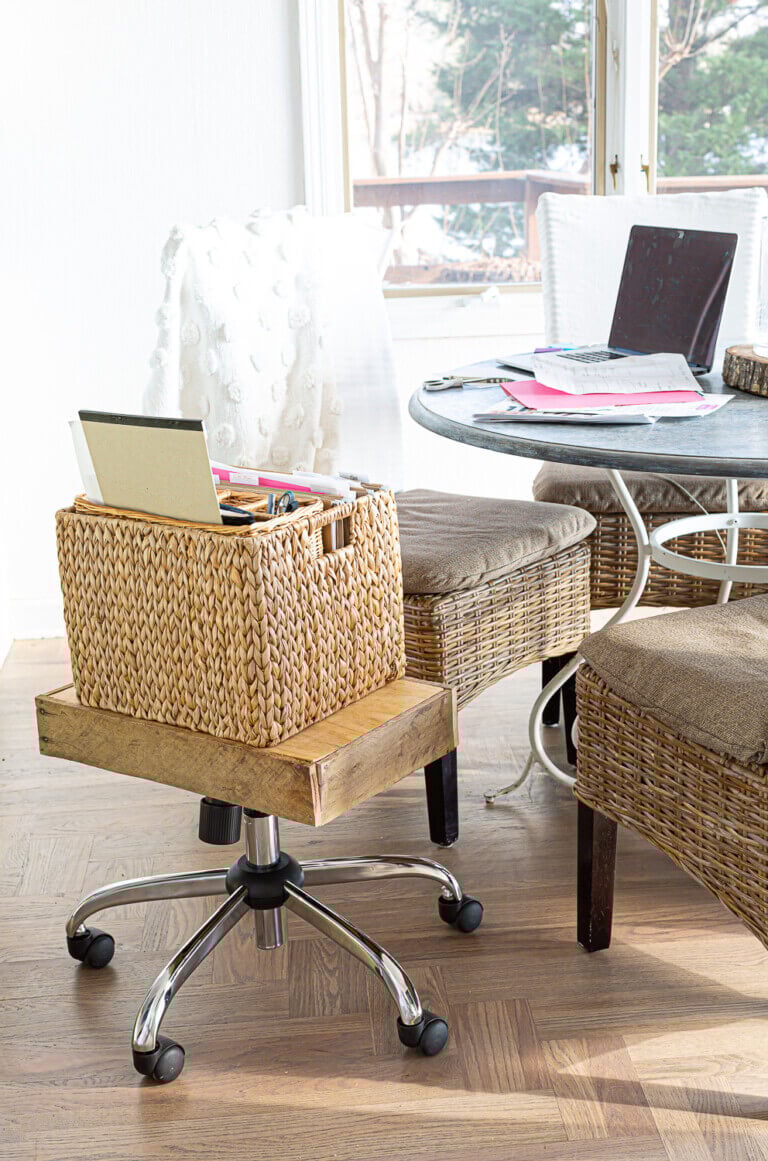 Mobile hanging file folder organizer by kitchen table.