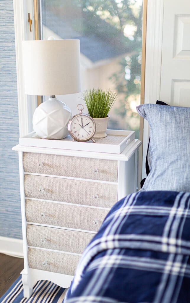 Small chest of drawers made over using table placemats to create the look of high end woven raffia furniture.