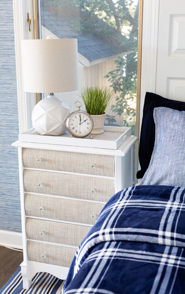 Winter blue and white bedding and woven fronted nightstand