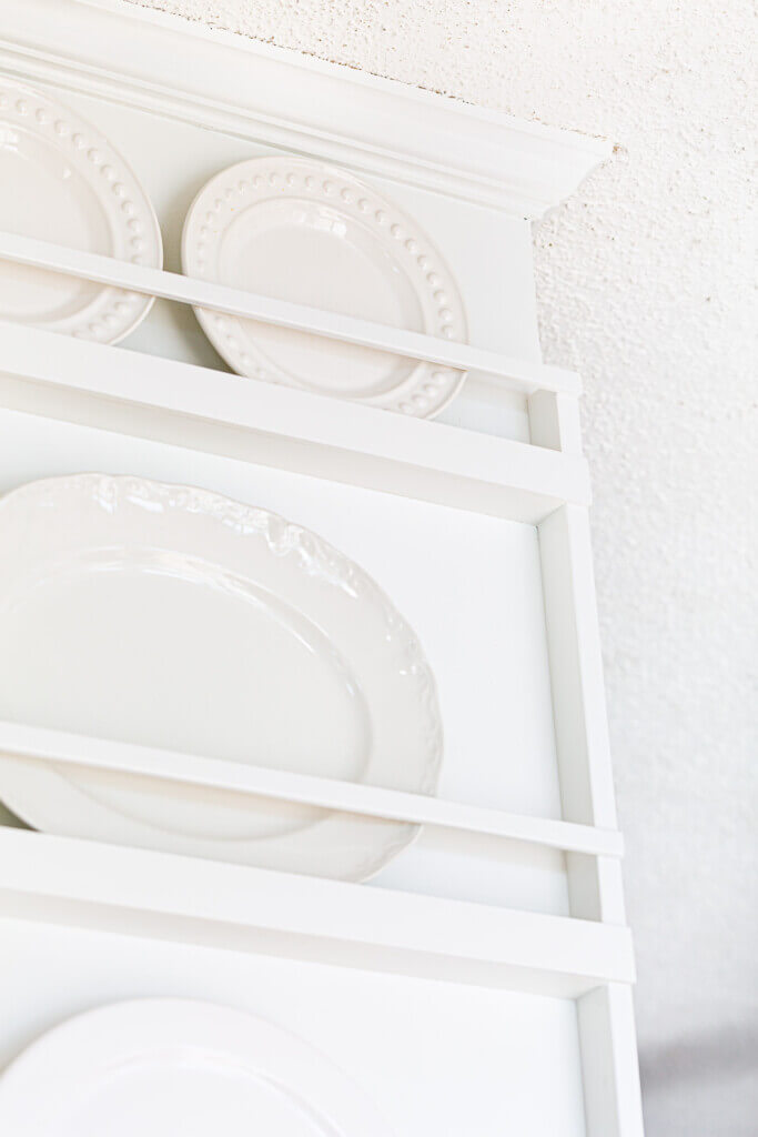 Top most section of DIY built in plate rack wall.