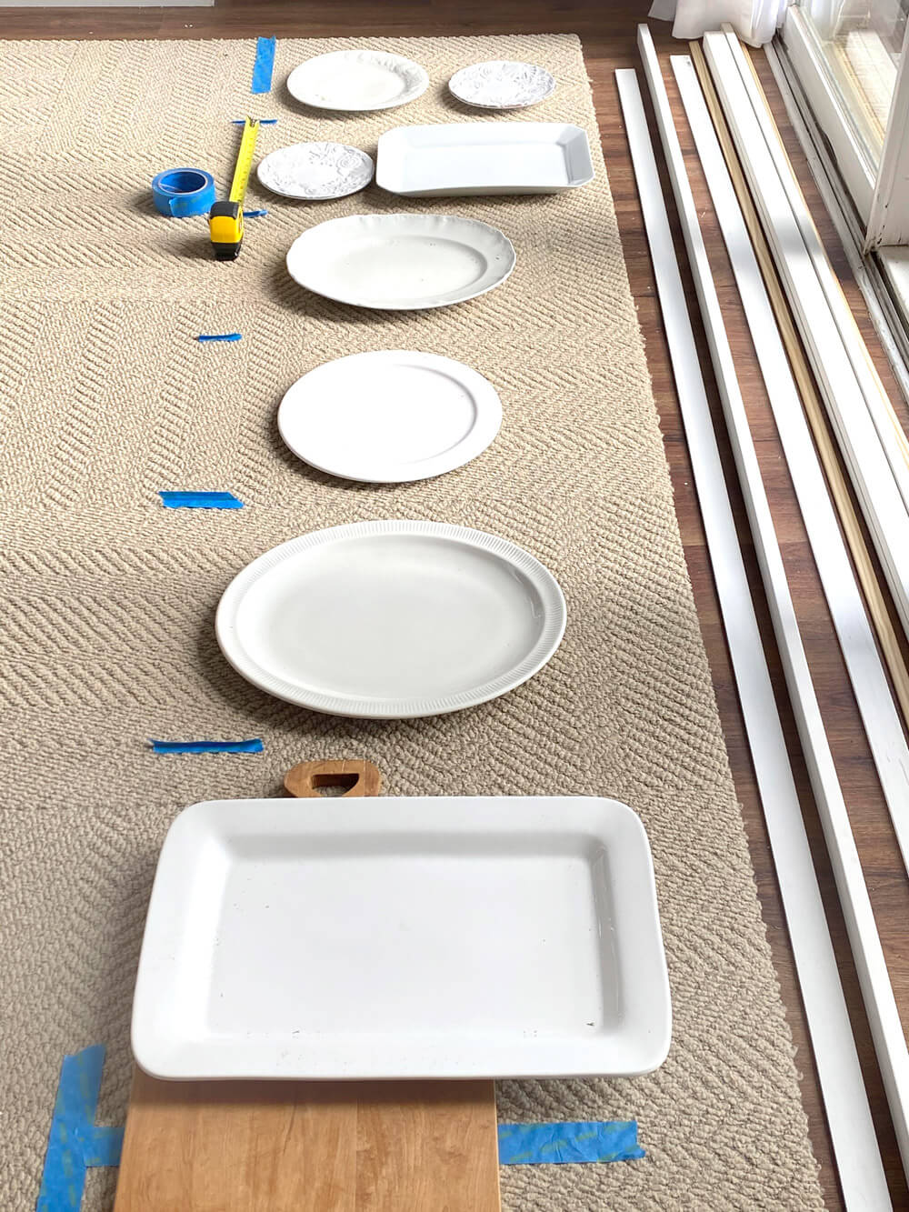 Figure out how to space your shelves when making a plate rack for a wall.