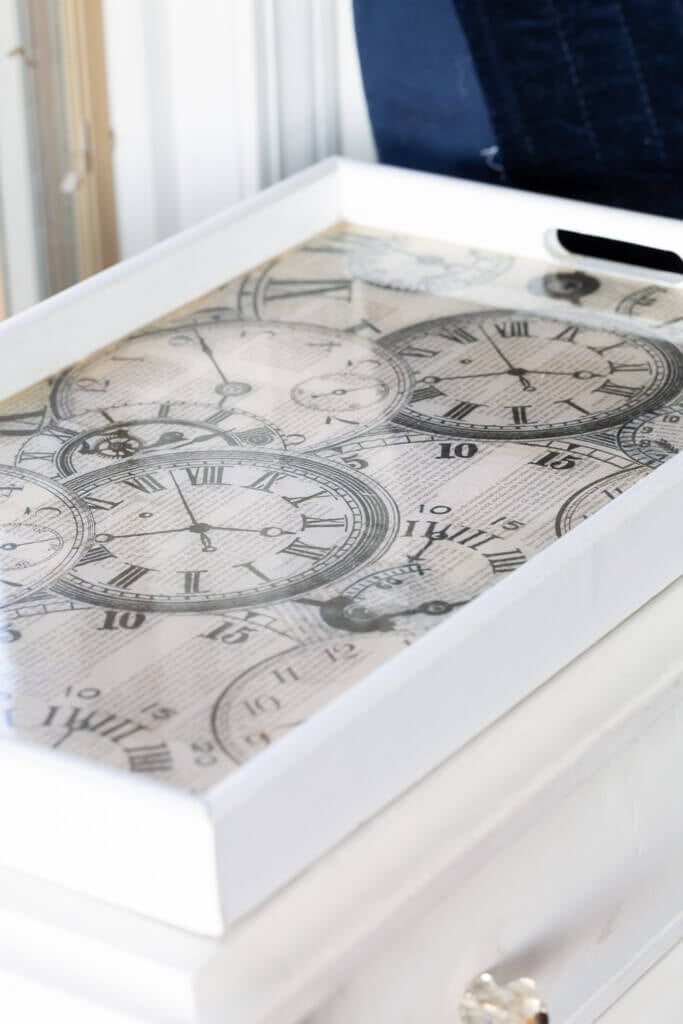 clock motif on night table tray