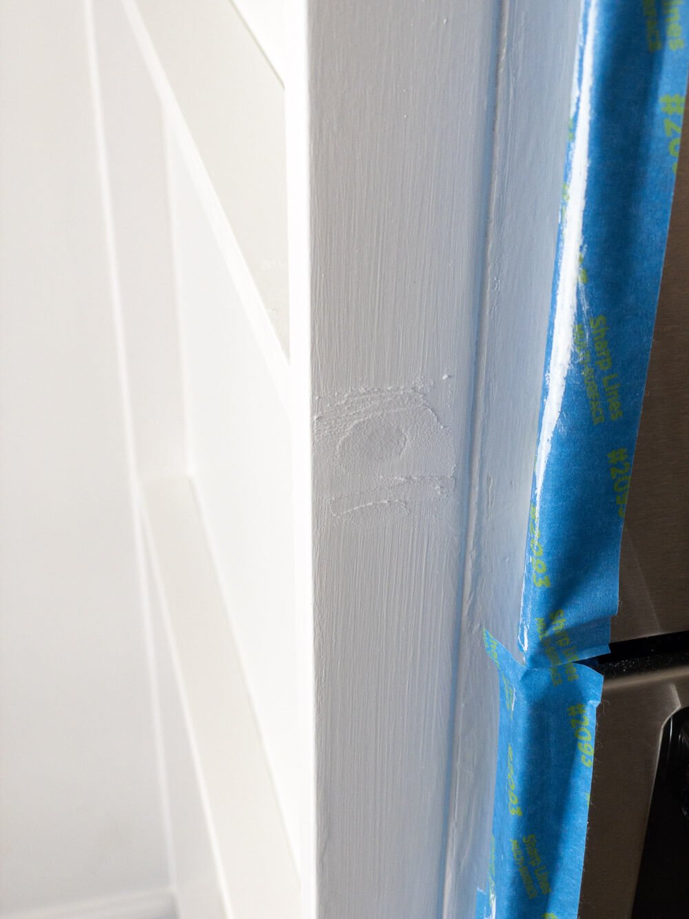 Spackle over wood screw holes