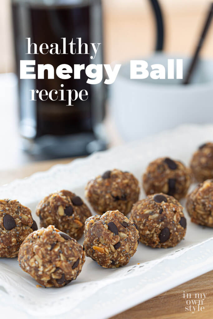 Rows of oatmeal chocolate chip energy balls on a plate. Text overlay says healthy energy ball recipe.