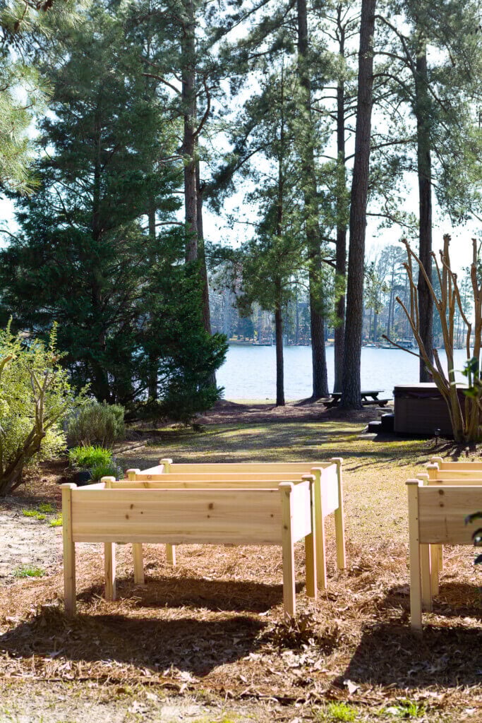 Elevated cedar planter boxes in a yard.