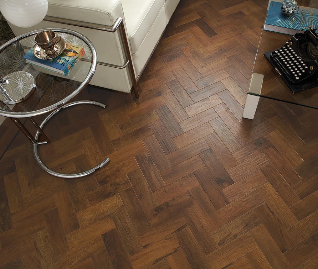 Herringbone design on resilient floor of luxury vinyl plank.