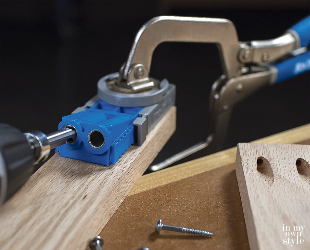 a Kreg jig and clamp showing how pocket holes are made in wood.