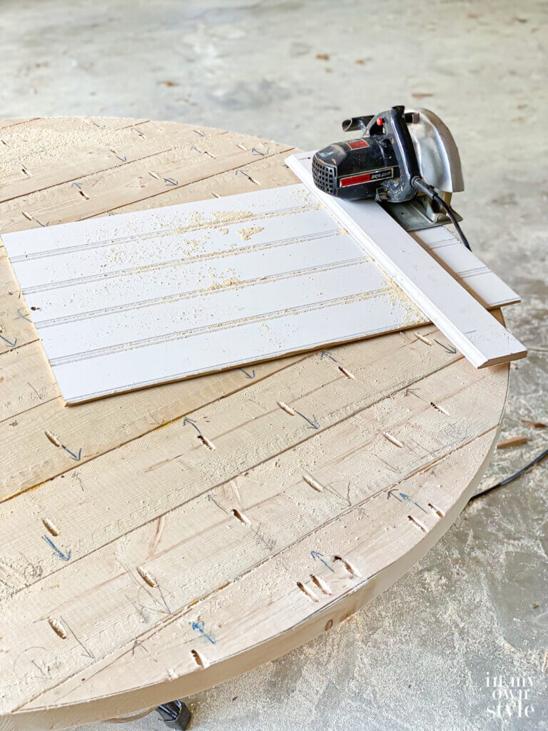 How to make a wood cutting jig to make a round table using a circular saw.