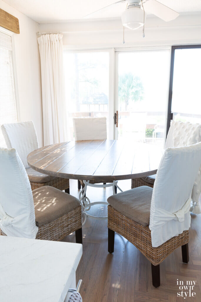 Completed table showing the matte sheen on it from the light coming from a door.
