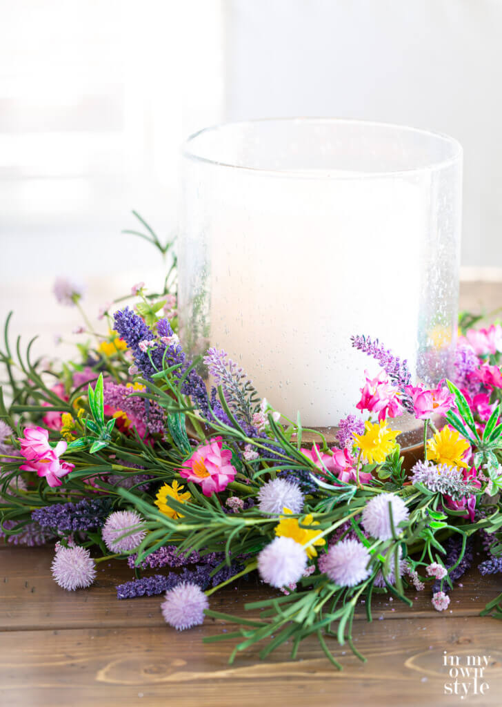 Wildflower wreath around a candle to make a table centerpiece.
