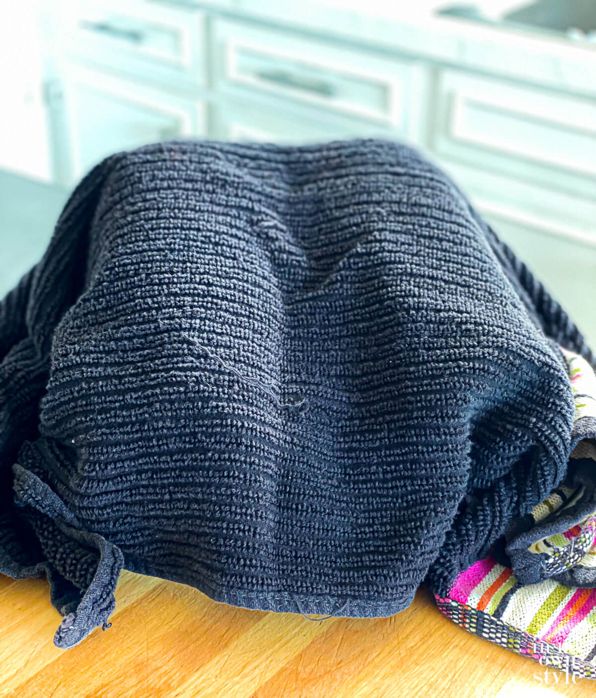 Dishtowel cover over sprouting jars.