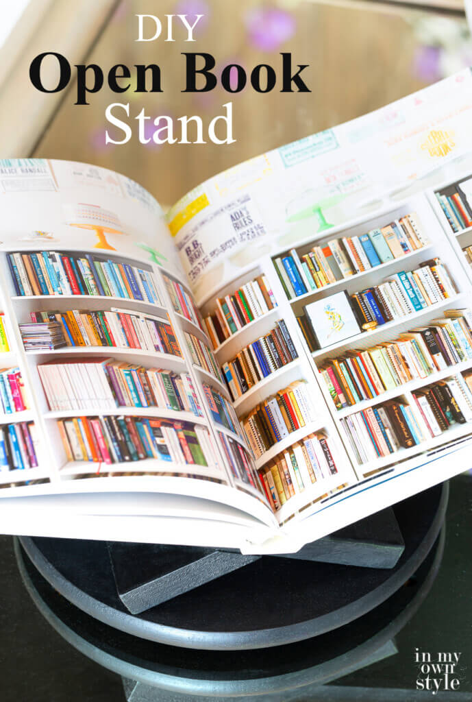 DIY Open Book Stand on coffee table with opened book being displayed on it.