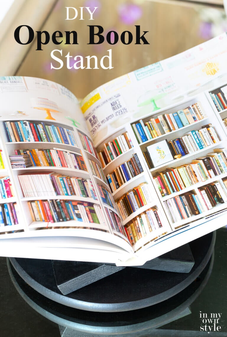 DIY Open Book Stand on coffee table with opened book being displayed on it.