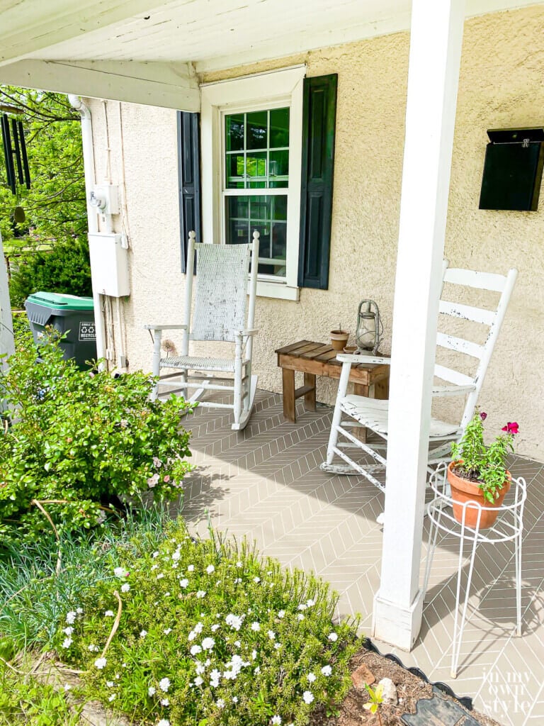 Completed concrete porch painting project all ready to enjoy.