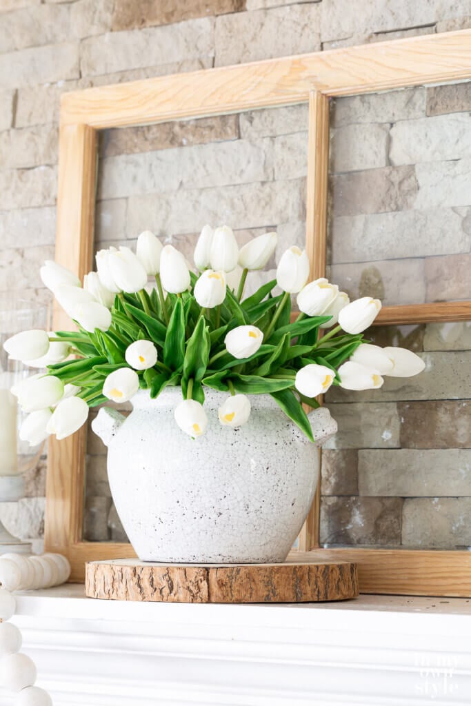 summer themed mantel using a white and green color scheme