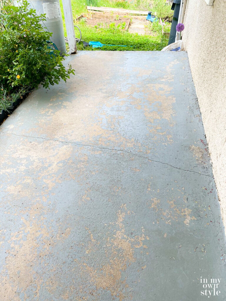 Worn and ugly concrete porch before getting a makeover