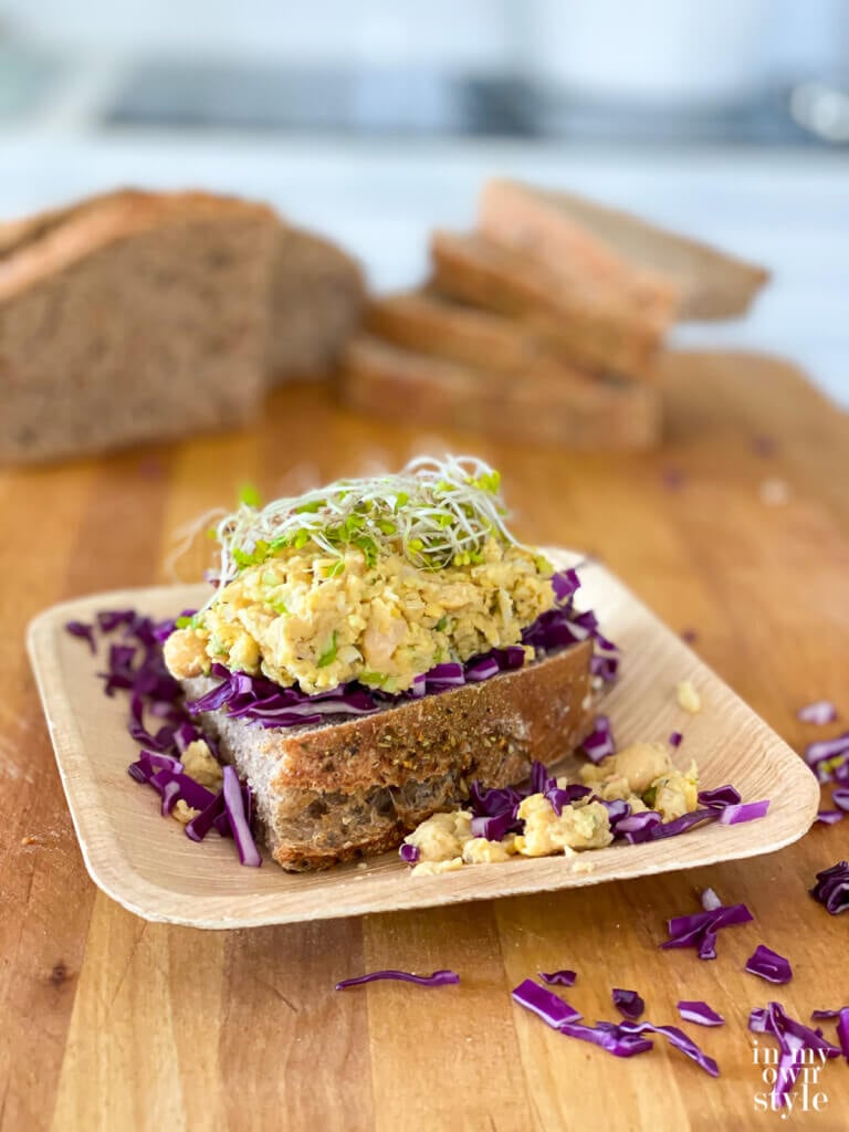Smashed chickpea salad sandwich served deli style