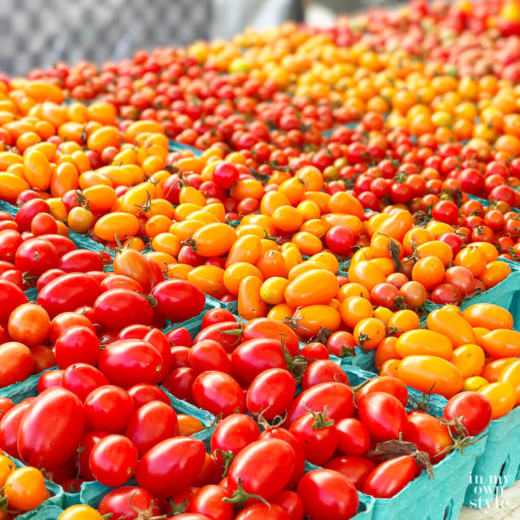 a variety of tomatoes at the farmers market