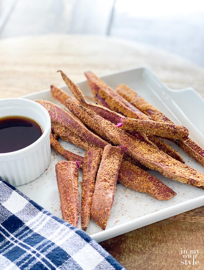 Crispy No Oil Sweet Potato Fries on a plate with dipping sauce on the side.