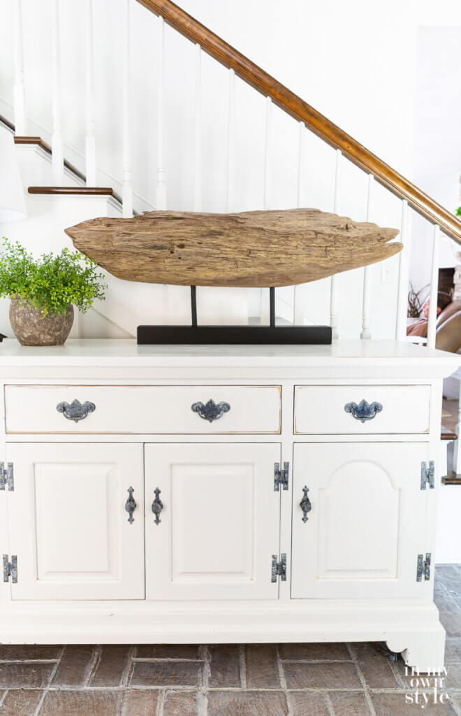 Make your own modern art using driftwood to make a table top display stand for it.  DIY Wood Artifact Stand accent decor.
