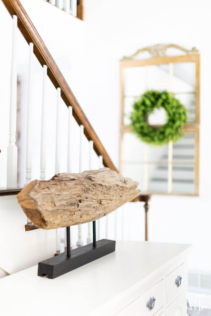modern art made using driftwood and parts of a wood pallet