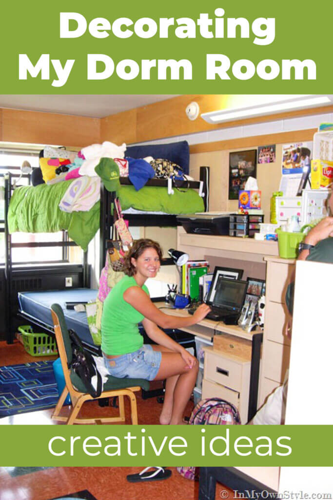 College student sitting at desk in a dorm room figuring out where to put everything in the small room. Text overlay says Decorating My Dorm Room creative ideas.