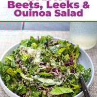 Roasted Beets, Leeks and Quinoa salad in low sided white bowl.