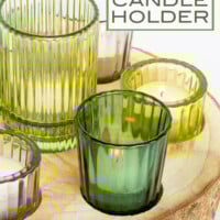 DIY Wood Slice Candleholder with ribbed green glass votives.