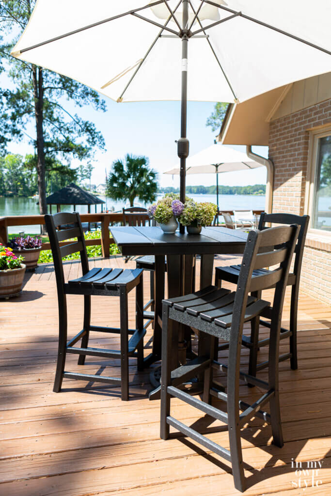 Polywood high top table with an umbrella
