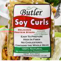 A bag of so curls with text asking have you tried these yet?