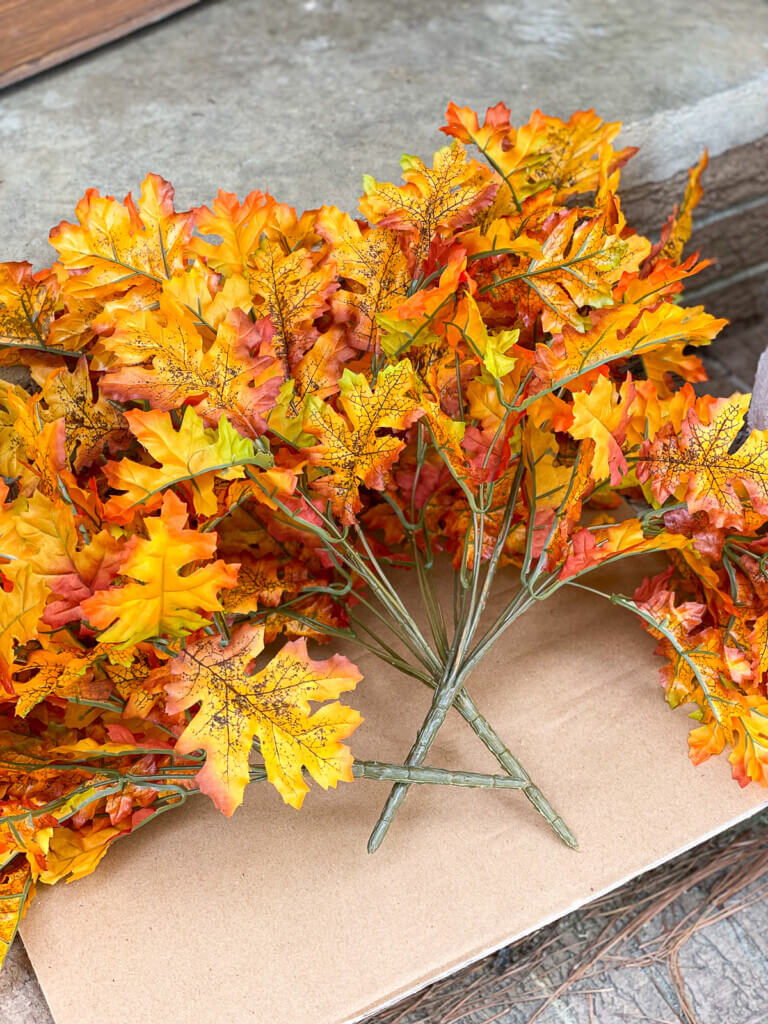 faux fall leaves for fall door decor diy