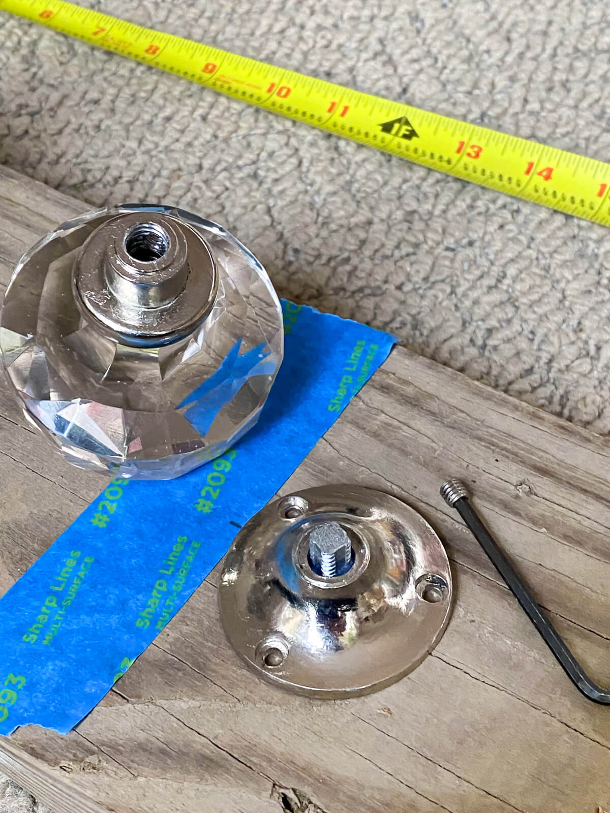 How to attach glass door knob to wood board to make a blanket holder for a living room.