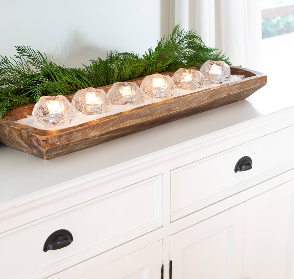 Kosta Boda snowball candles in long wood dough bowl