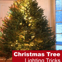 Christmas tree in living room with white glowing lights in the center. Text overlay says - Christmas tree lighting tips you don't want to miss.