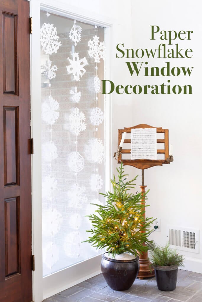 Christmas window decorations indoor - hanging paper snowflakes