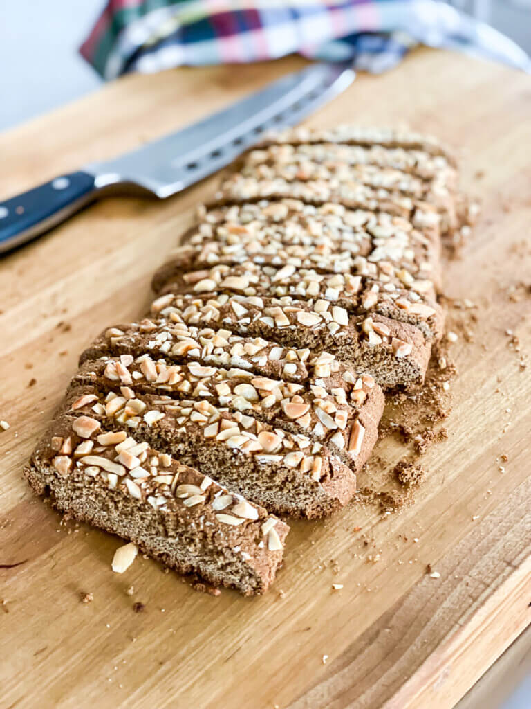 Just baked and sliced gingerbread biscotti on a cutting board