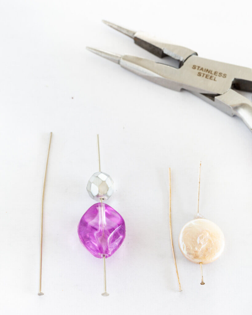 Beads on endpins to make drop earrings for pierced ears